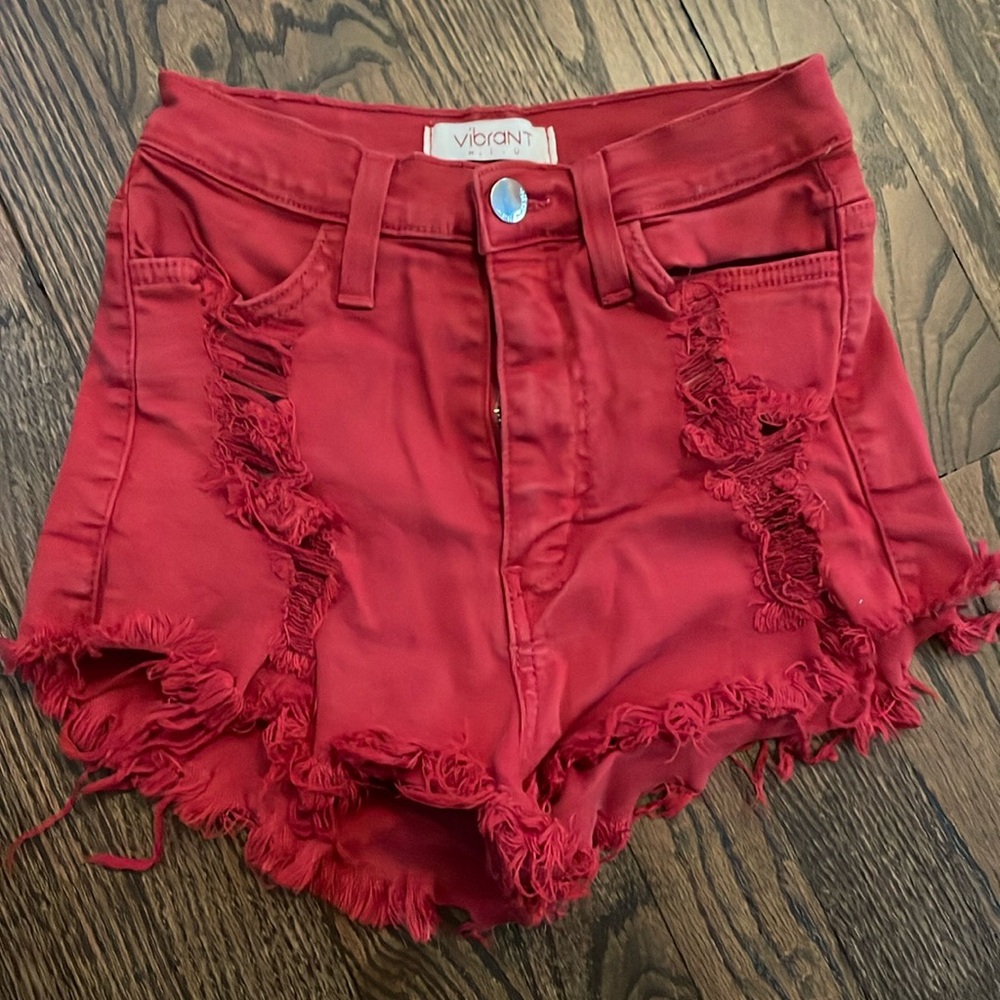 Jean shorts, red, frayed cut off is near perfect condition, small